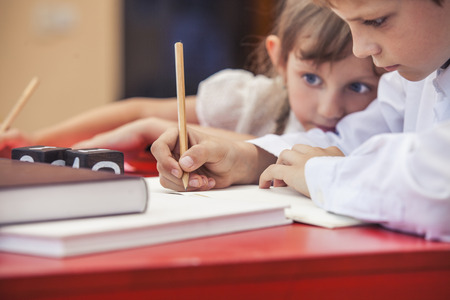Boy, girl children in the school has a happy, curious, smart. Education, day of knowledge, science, generation, pre-school.の写真素材