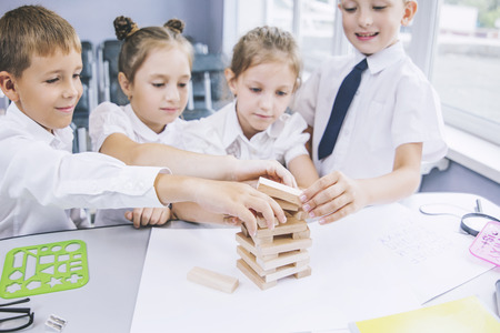 Beautiful children are students together in a classroom at the school receive education happyの写真素材