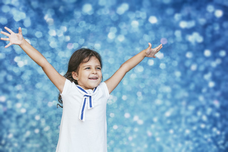 Little girl child cute and beautiful background glare happy happyの写真素材