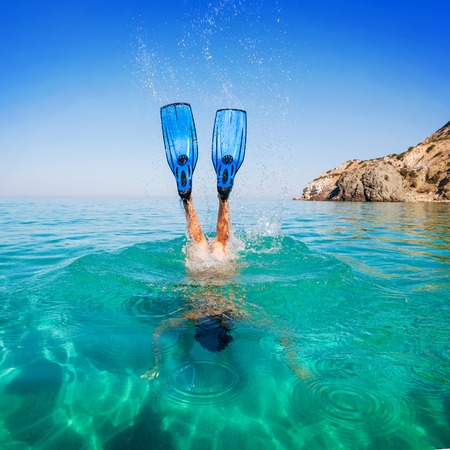 Diving. Women snorkeling in flippers beach islands. Girl divesの写真素材