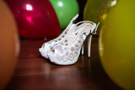 Shoes white of the bride on the floor 1の写真素材