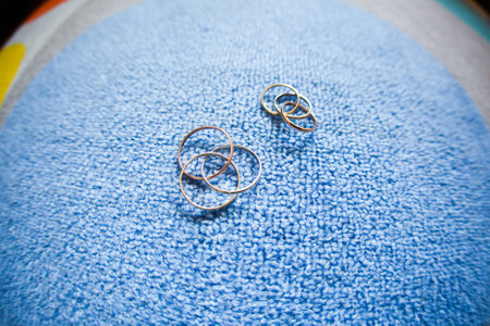 wedding wedding rings on a blue carpet