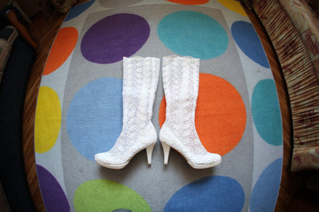 White wedding boots bride on the carpet spnego, yellow 1の写真素材