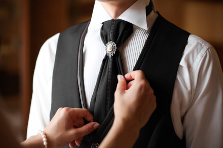 Groom in white shirt and black trousers 1の写真素材