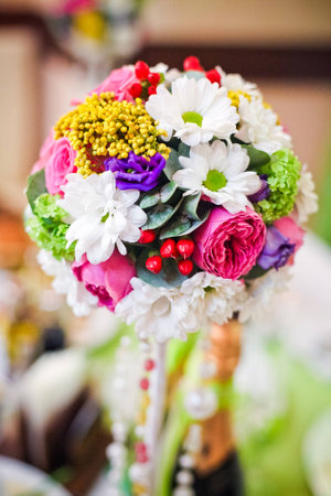 Wedding flowers roses and daisies bright on the table 1の写真素材