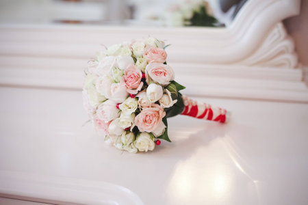 Wedding bouquet of roses on the table 1の写真素材