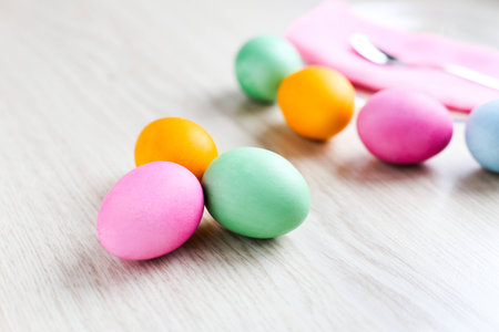 Colorful Easter eggs on white table 1の写真素材