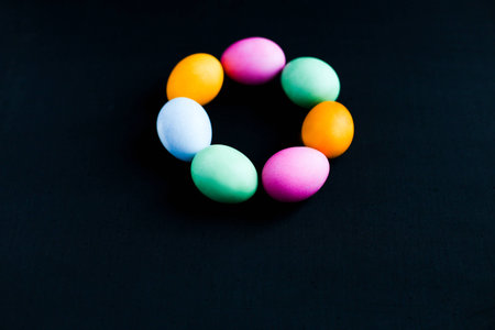 Easter eggs on a black tableの写真素材
