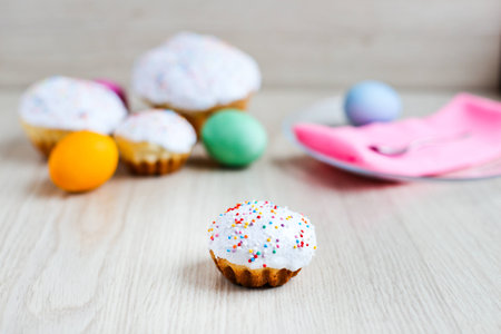 The Easter cake and colourful  eggs on a white table 1の写真素材