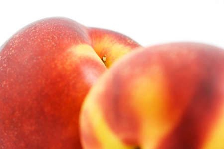 Isolated photo of two big fresh nectarinesの写真素材