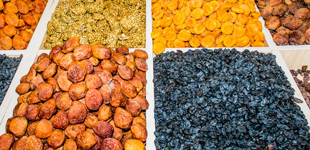 Shelves of dried fruits in the storeの写真素材