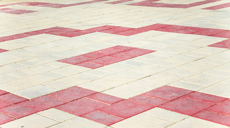 Sidewalk tiles in the city park as a backgroundの写真素材