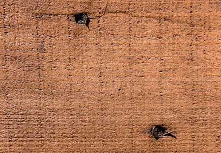 Wooden board covered with stains as backgroundの写真素材