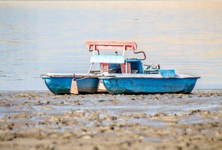 Old catamaran on the beach
