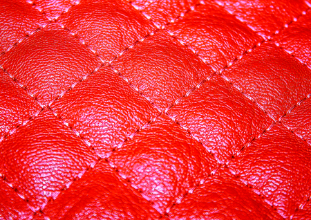 Abstract background of artificial leather with drapery