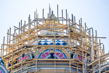 Building with scaffolding - restorationの写真素材