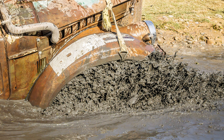 Auto stuck in the mud