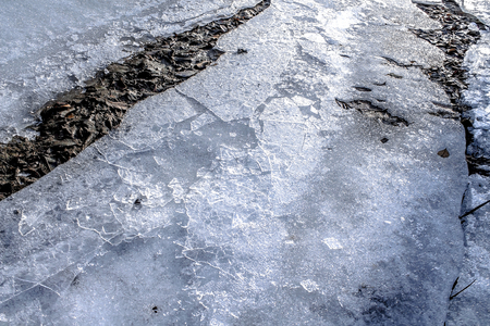 Ice in the ditchの写真素材