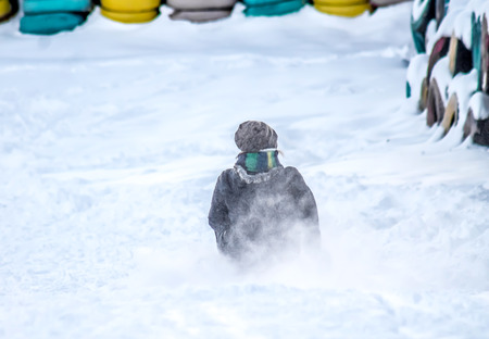 Sledding from the mountainside at the ski resort