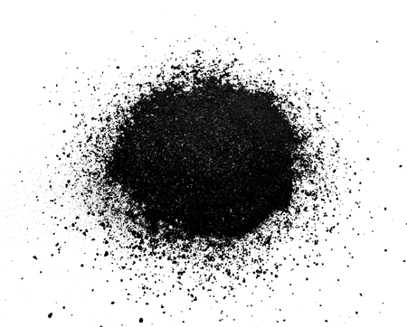 Abstract pattern of black powder on white backgroundの写真素材