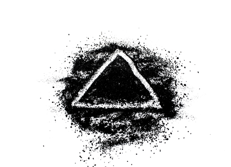 Abstract pattern of black powder on white backgroundの写真素材