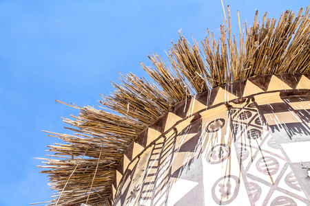 Roof Buildings from bulrush against the skyの写真素材