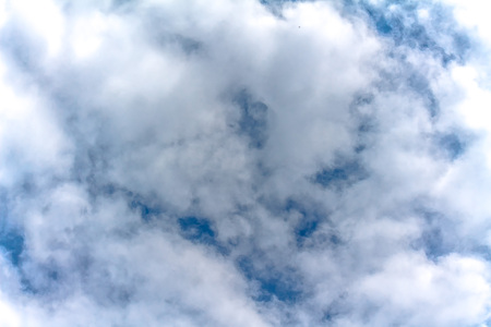 Thick white clouds on a blue sky