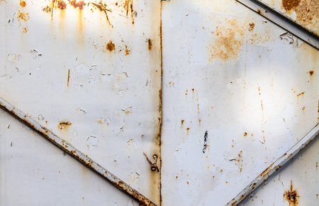 Rusty painted metal sheet as an abstract backgroundの写真素材