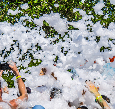 People in foam at a foam party