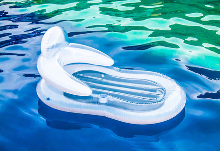 Inflatable balloon for swimming in the water in the pool