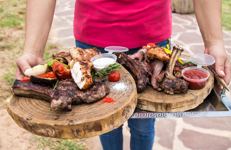 Meat cooked on the grill in the nature on the spacing