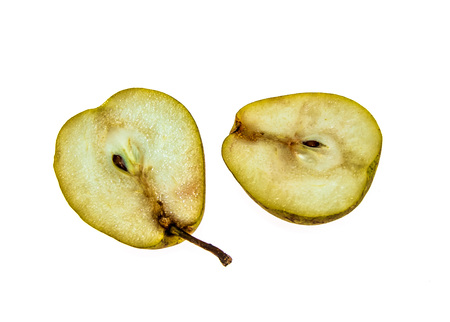 Halves of pear isolated on a white backgroundの写真素材