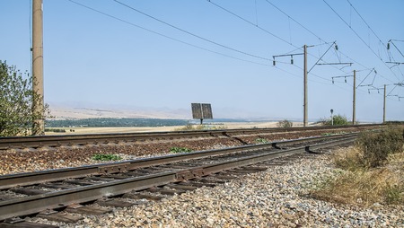 Railway embankment with Rails and sleepers close-upの写真素材