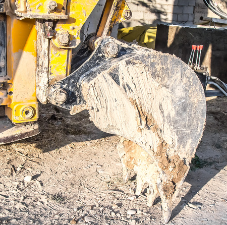 Bucket dredge in the mud