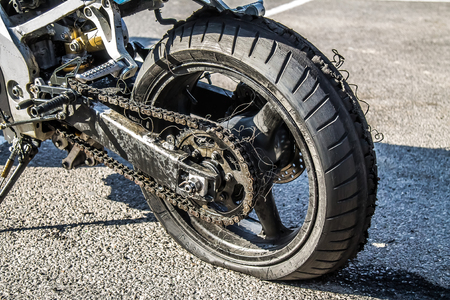 Worn motorcycle wheel after driftの写真素材