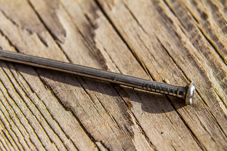 Nail on wooden surfaceの写真素材