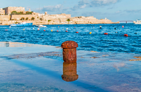 Old berth bollard for the mooring of ships