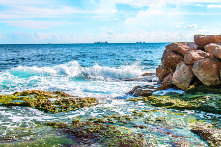 Sea waves wash rocky stones - seascapeの写真素材