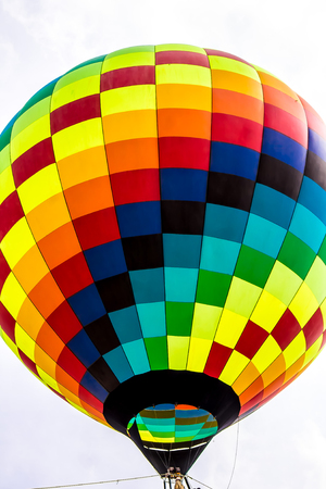 Multicolored balloon in the skyの写真素材