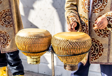 Playing on the national Uzbek musical instruments