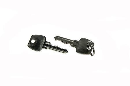 The keys to the lock on a white background