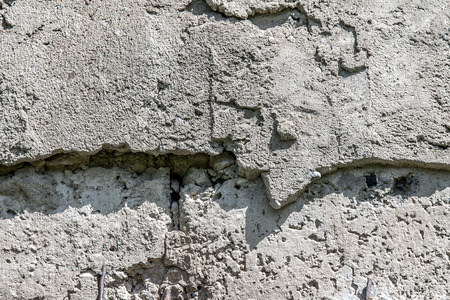 Rough gray concrete wall as background in natureの写真素材