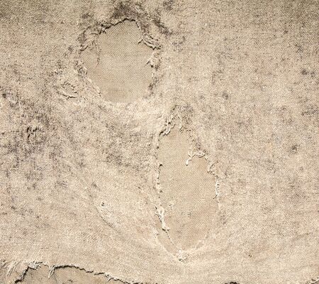 Old ragged floor cloth as an abstract backgroundの写真素材