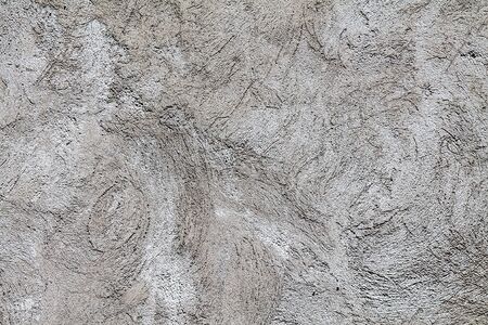 Gray plastered wall as an abstract background