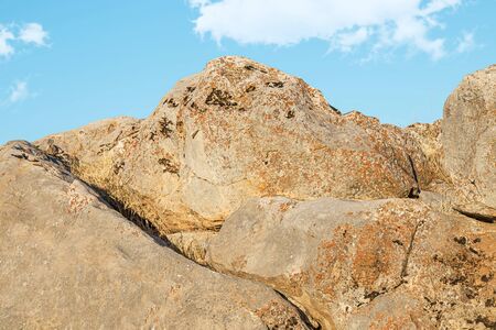 Stones rocks rocky ground against the sky