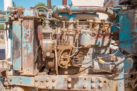 Old dirty tractor engine close-upの写真素材