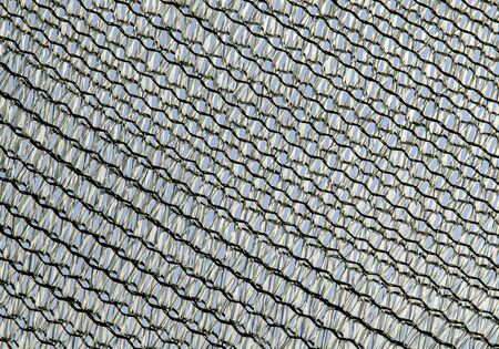 Gray mesh fabric as abstract backgroundの写真素材