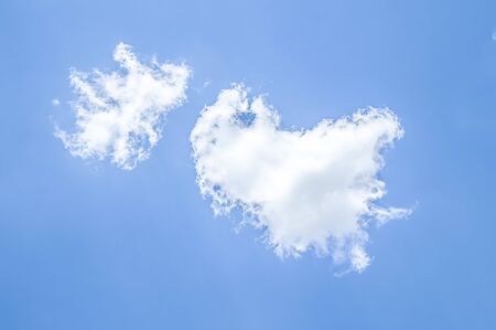 White cloud on a blue sky as a background, screensavers on a computer, creativity for design.の写真素材
