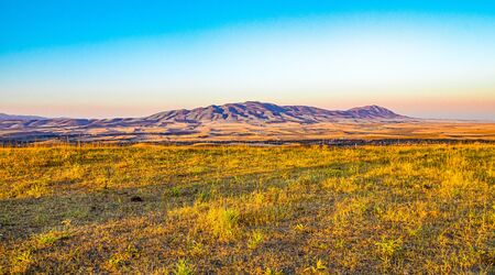 Mountain valley illuminated by the rising sun. Landscapeの写真素材