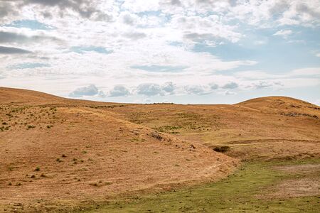 Rocky hills against the sky. Mountain landscape.の写真素材